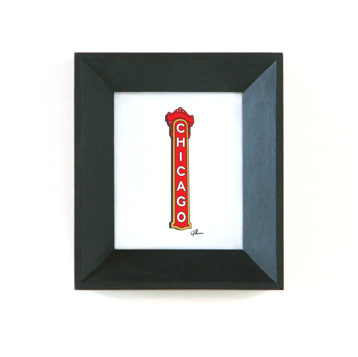 little framed art pieces of the chicago theatre sign in illinois