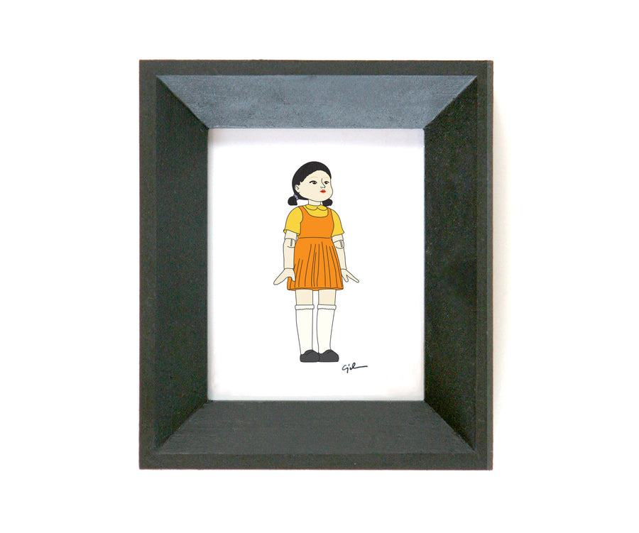 framed art of the squid game doll by united goods