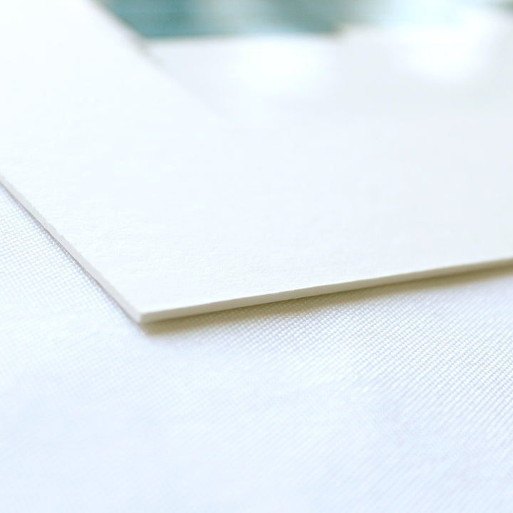 close up look at a white archival quality mat for art prints to frame