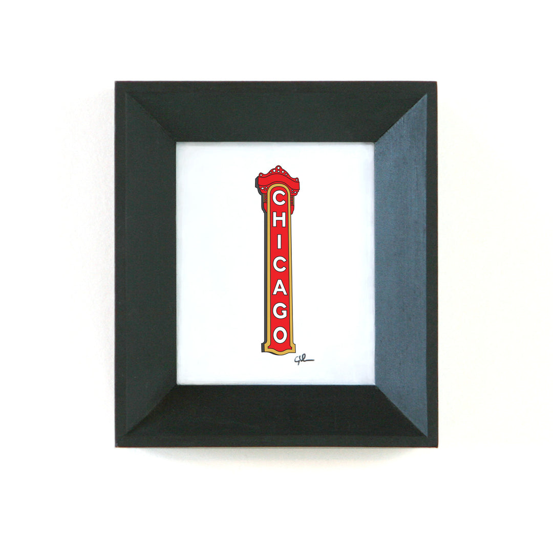 little framed art pieces of the chicago theatre sign in illinois
