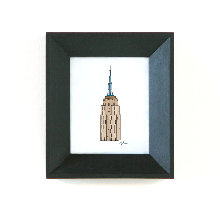 empire state building drawing in a black frame